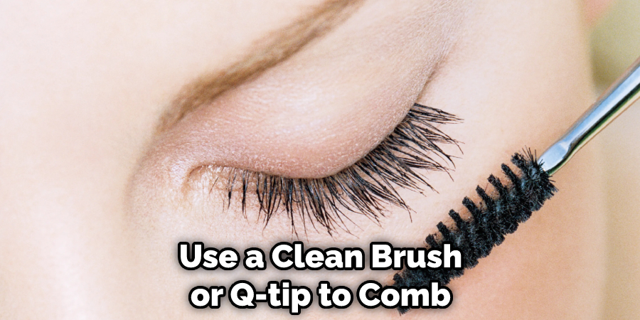 Use a Clean Brush or Q-tip to Comb