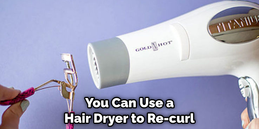 use a hair dryer to re-curl 