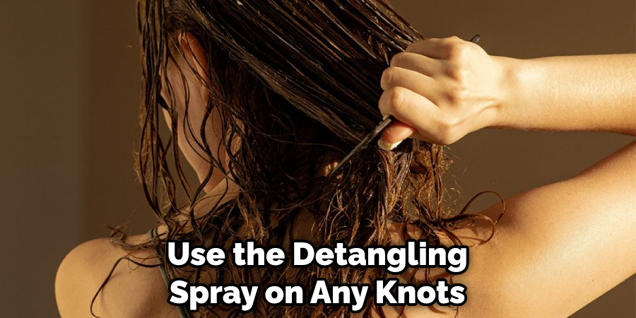 Use the Detangling Spray on Any Knots