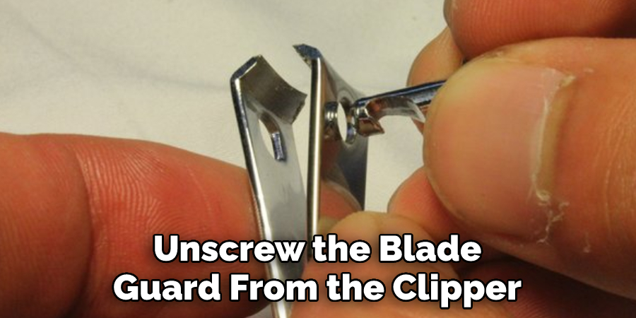 Unscrew the Blade Guard From the Clipper