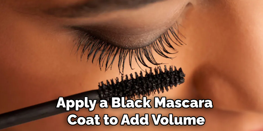 Apply a Black Mascara Coat to Add Volume