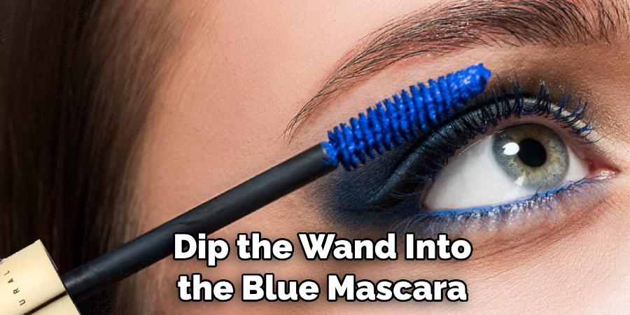 Dip the Wand Into the Blue Mascara