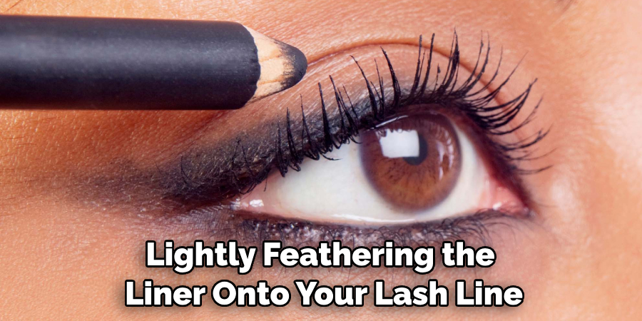 Lightly Feathering the Liner Onto Your Lash Line