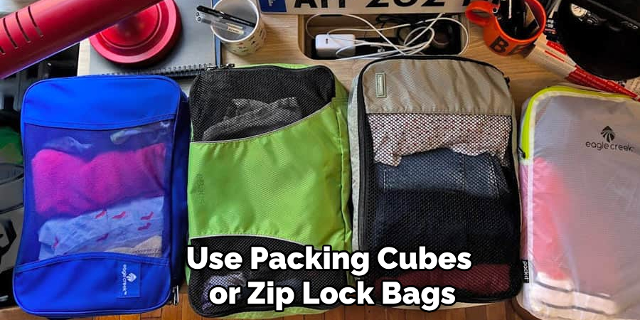 Use Packing Cubes or Zip Lock Bags