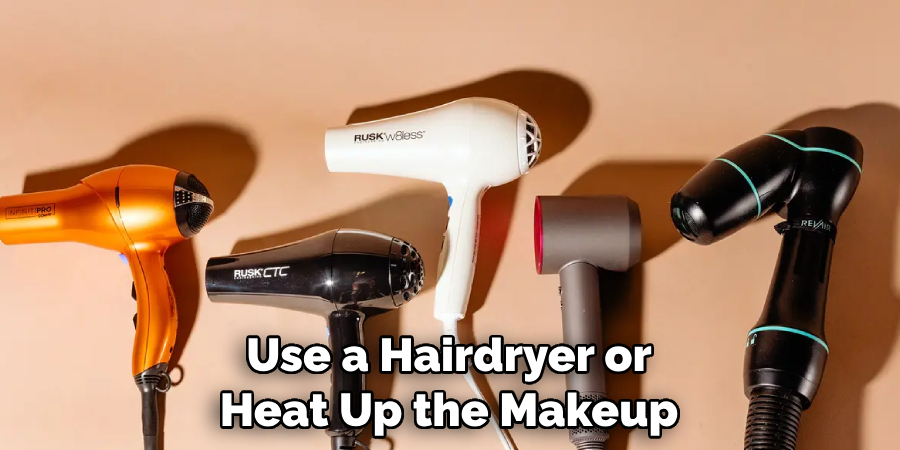 Use a Hairdryer or Heat Up the Makeup