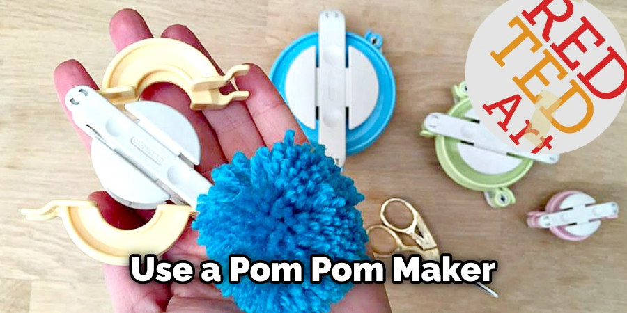 Use a Pom Pom Maker