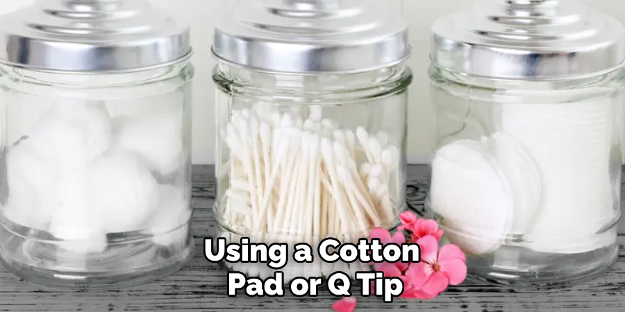 Using a Cotton Pad or Q Tip