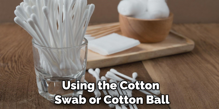 Using the Cotton Swab or Cotton Ball