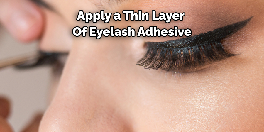 Apply a Thin Layer
Of Eyelash Adhesive