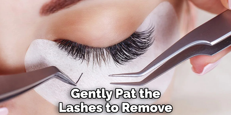 Gently Pat the Lashes to Remove