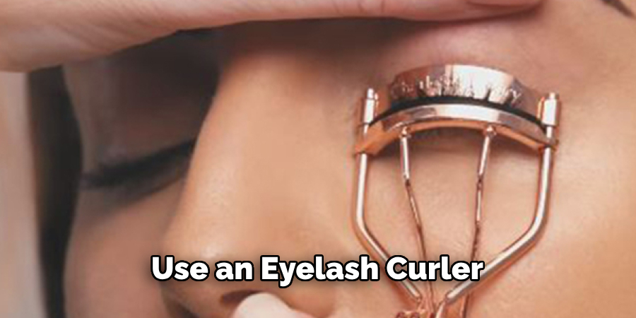 Use an Eyelash Curler