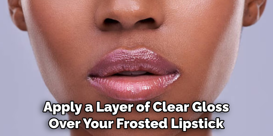 Apply a Layer of Clear Gloss Over Your Frosted Lipstick