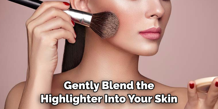 Gently Blend the Highlighter Into Your Skin