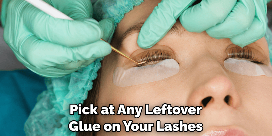 Pick at Any Leftover Glue on Your Lashes