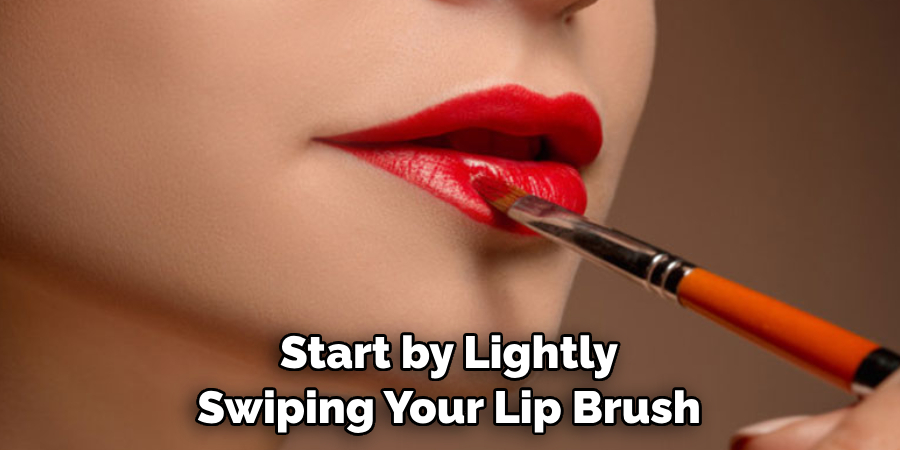 Start by Lightly Swiping Your Lip Brush