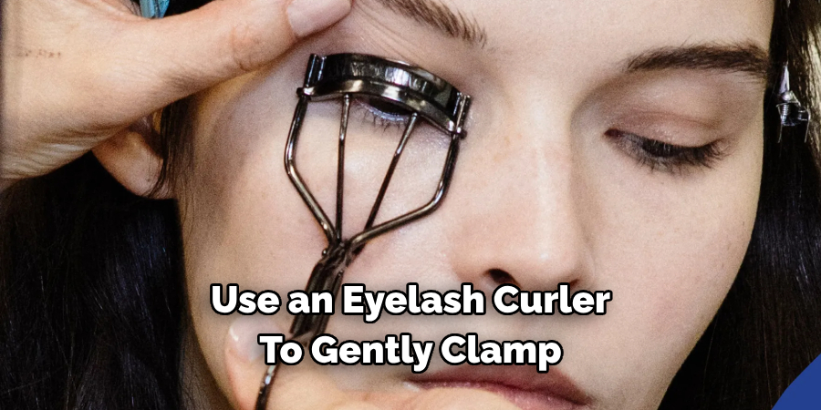 Use an Eyelash Curler 
To Gently Clamp