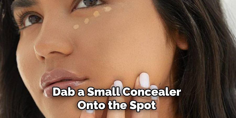 Dab a Small Concealer Onto the Spot 