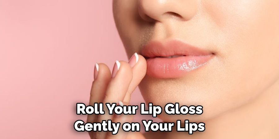 Roll Your Lip Gloss Gently on Your Lips