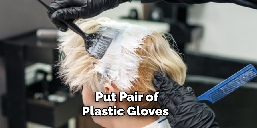 Put Pair of Plastic Gloves