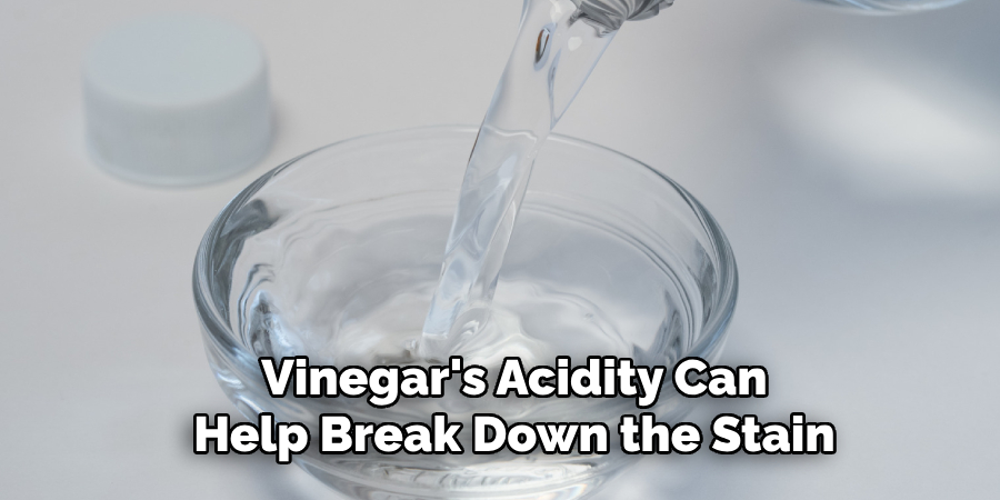 Vinegar's Acidity Can Help Break Down the Stain