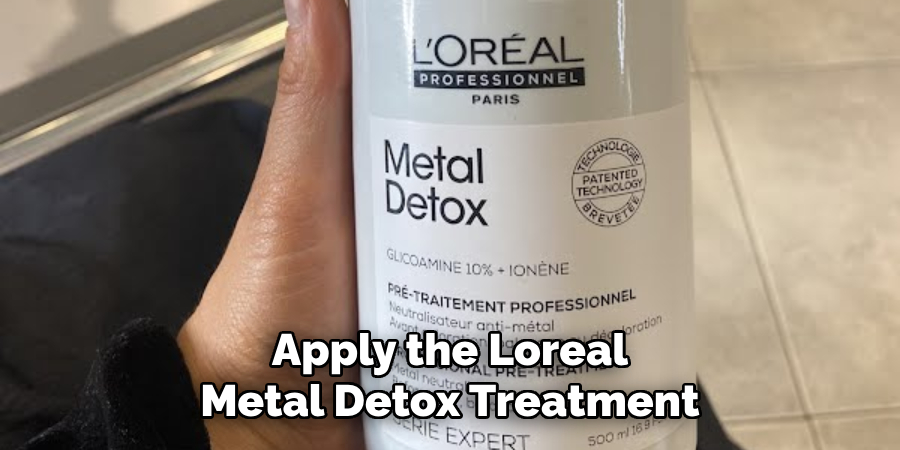 Apply the Loreal
Metal Detox Treatment