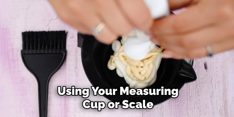 Using your measuring cup or scale