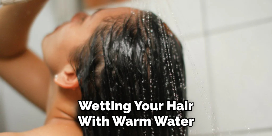 Wetting Your Hair
With Warm Water