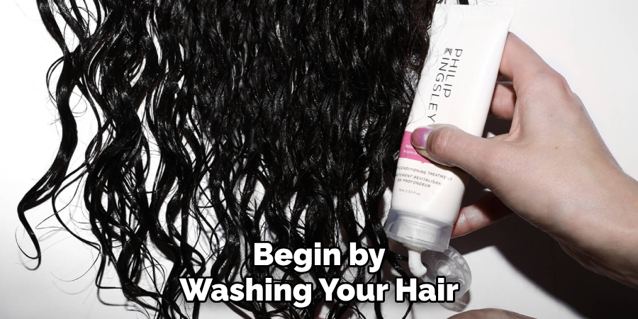 Begin by
Washing Your Hair