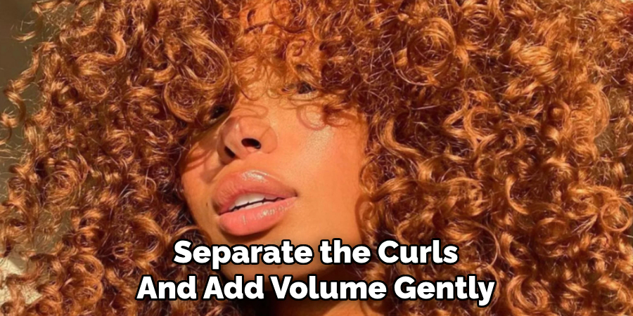 Separate the Curls
And Add Volume Gently