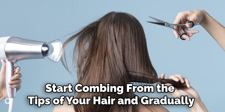 Start combing from the tips of your hair and gradually