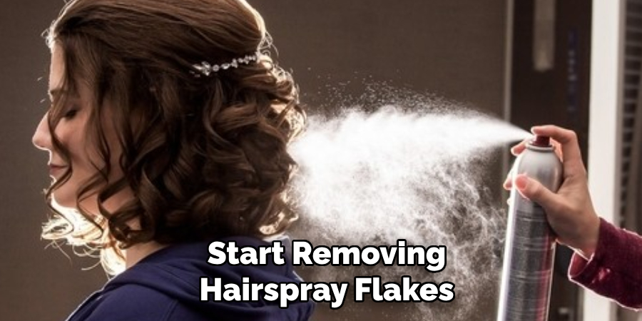 Start Removing 
Hairspray Flakes 