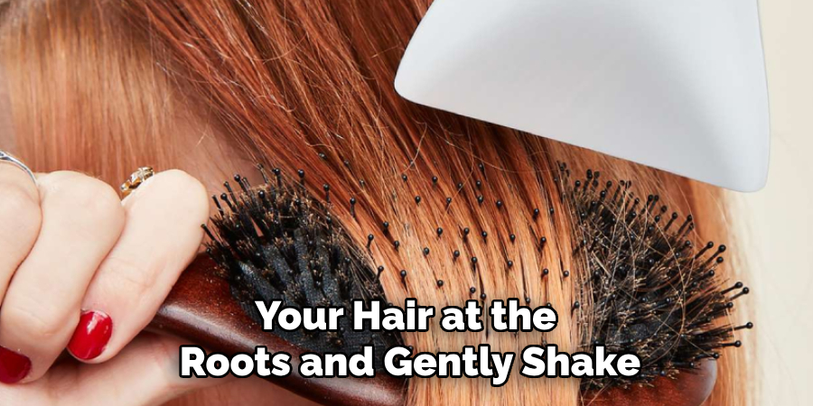 Your Hair at the 
Roots and Gently Shake