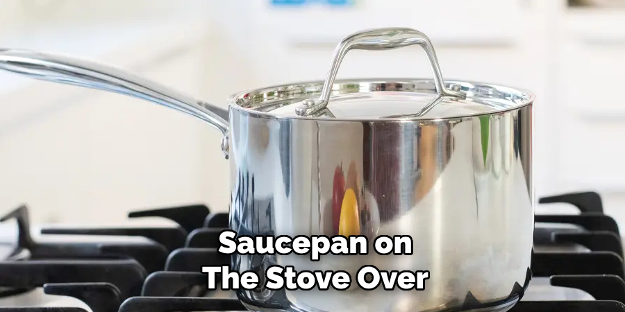 Saucepan on
The Stove Over
