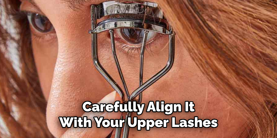 Carefully Align It
With Your Upper Lashes