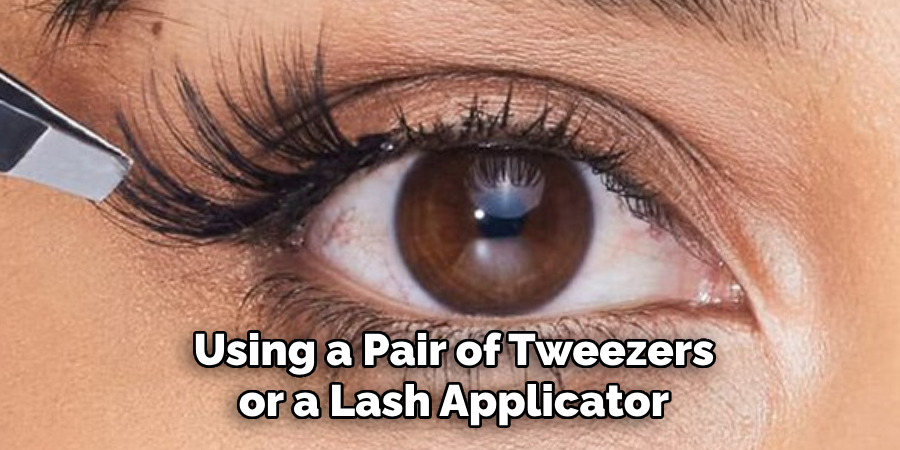 Using a Pair of Tweezers or a Lash Applicator