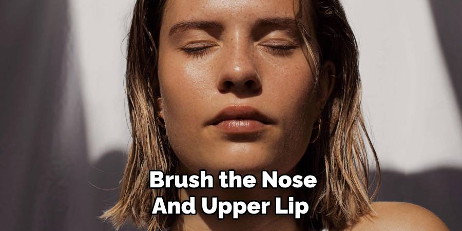 Brush the Nose and Upper Lip 