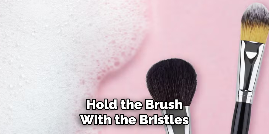 Hold the Brush With the Bristles