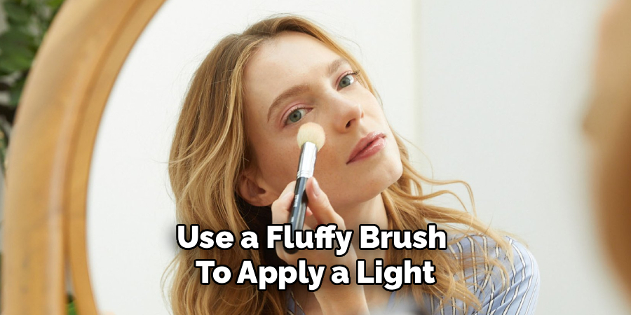 Use a Fluffy Brush 
To Apply a Light