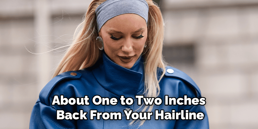 About One to Two Inches
Back From Your Hairline