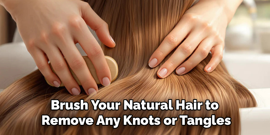 Brush Your Natural Hair to Remove Any Knots or Tangles