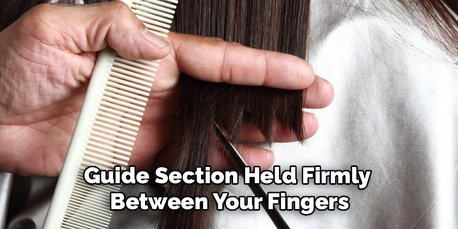 Guide Section Held Firmly
Between Your Fingers