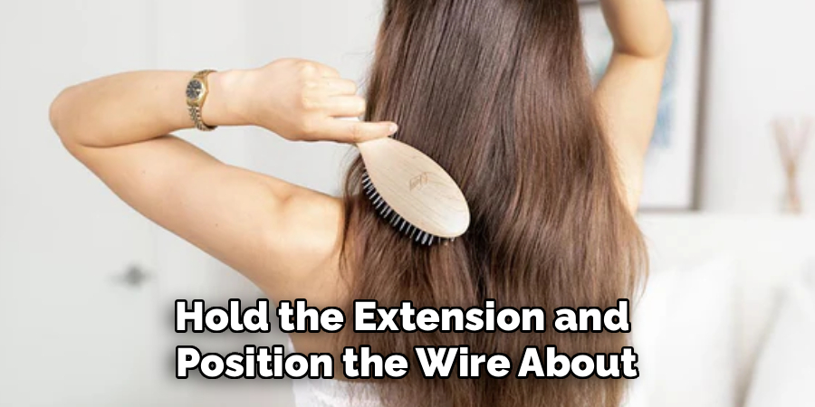 Hold the Extension and
Position the Wire About