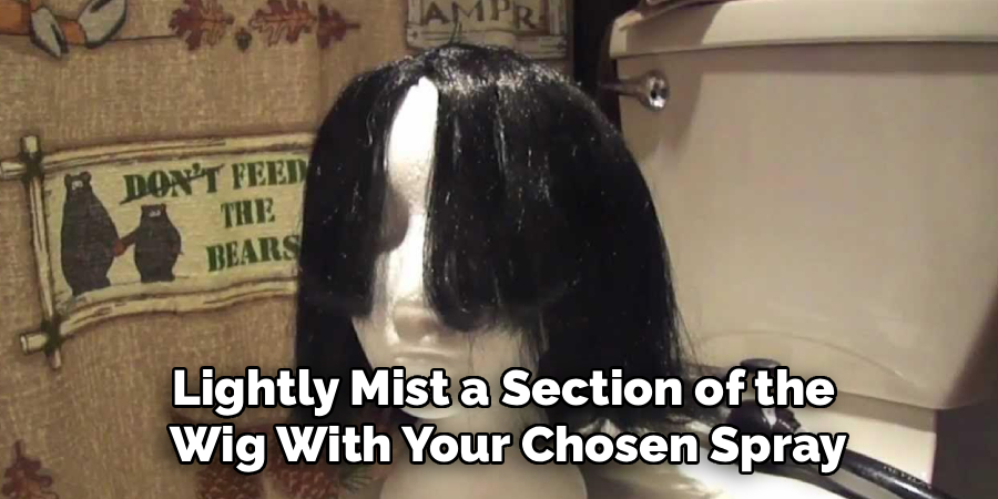 Lightly Mist a Section of the
Wig With Your Chosen Spray