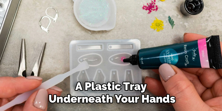 A Plastic Tray 
Underneath Your Hands