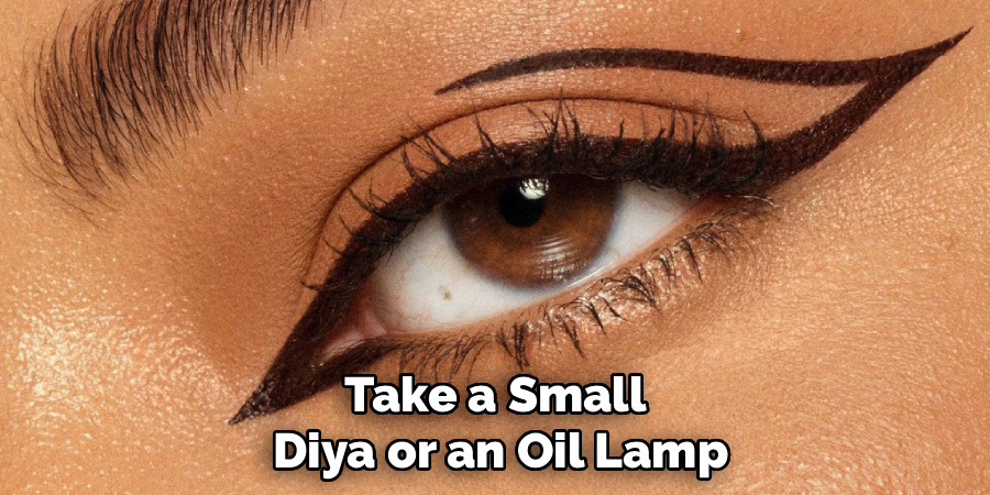Take a Small
Diya or an Oil Lamp