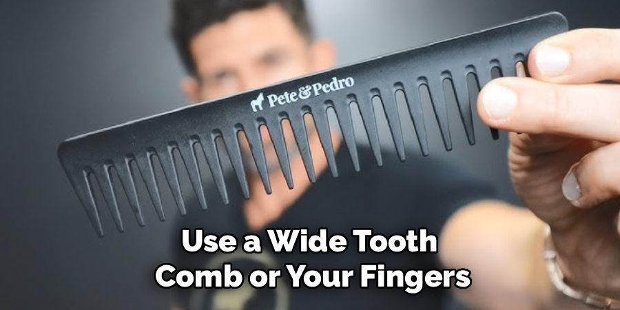 Use a Wide Tooth
Comb or Your Fingers