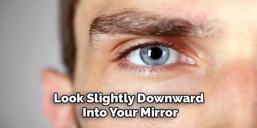 Look Slightly Downward
 Into Your Mirror