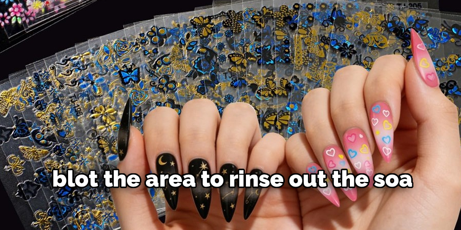 blot the area to rinse out the soa