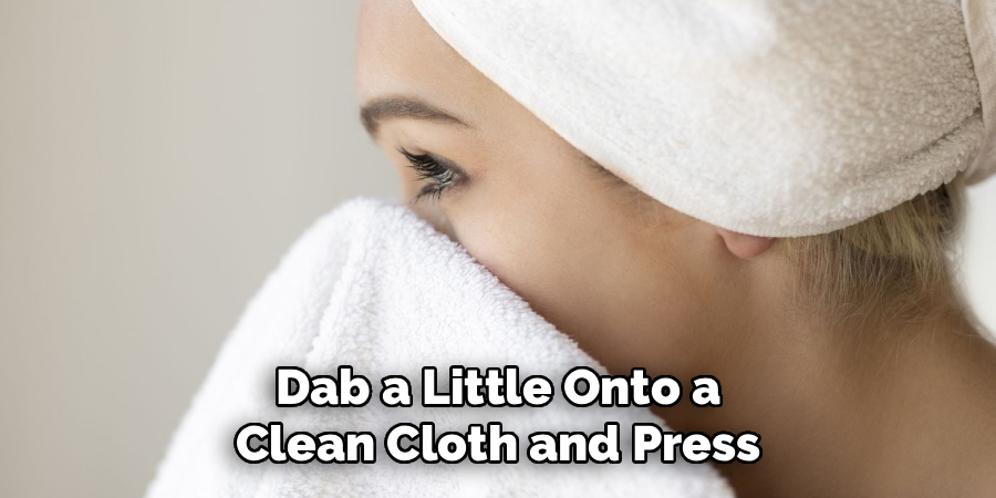 Dab a Little Onto a Clean Cloth and Press