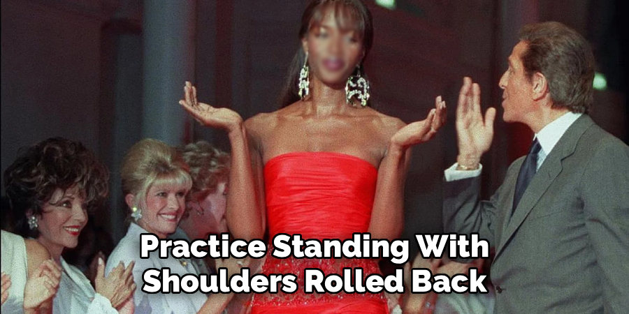 Practice Standing With
Shoulders Rolled Back